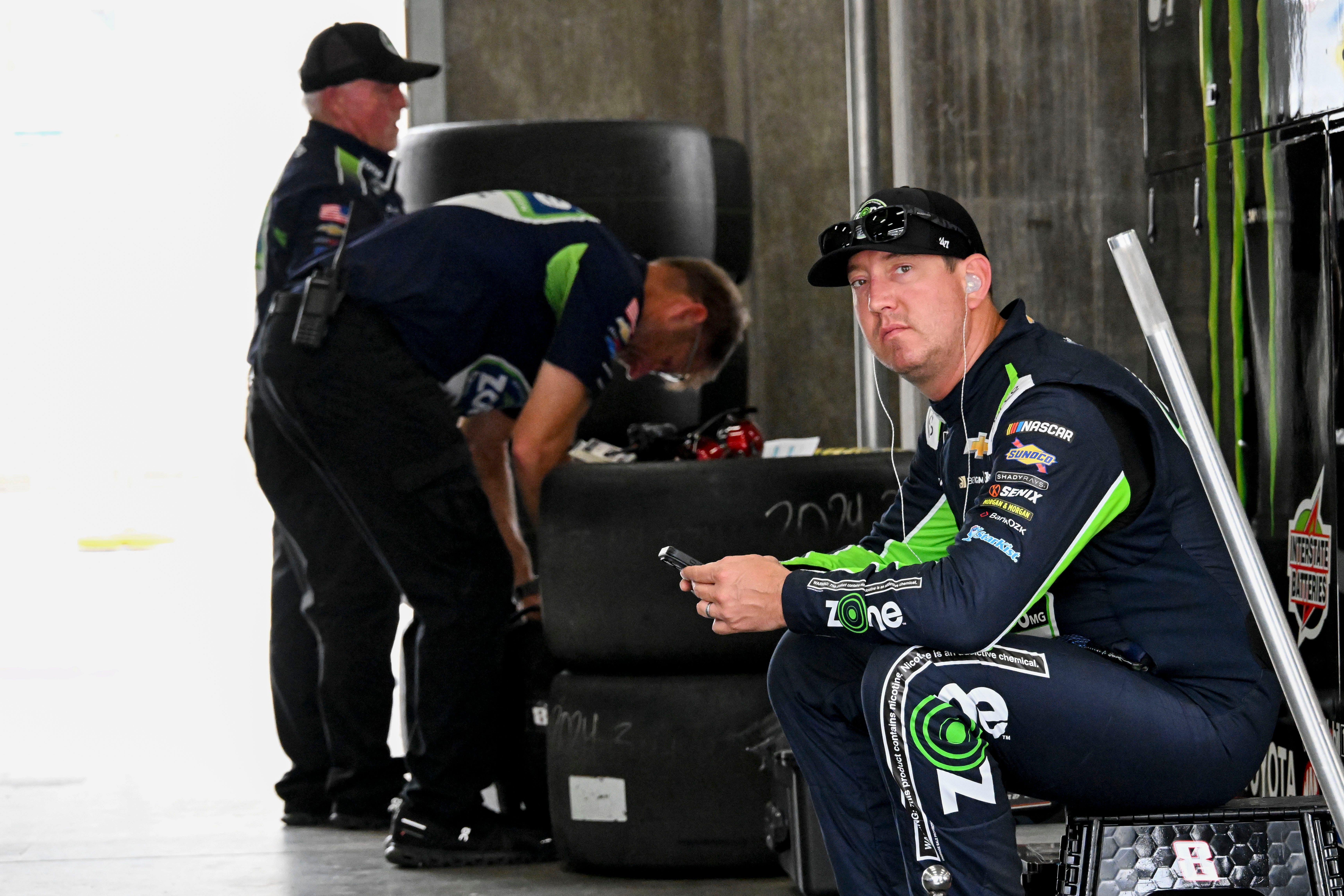 NASCAR Cup Series driver Kyle Busch sits in his garage at Indianapolis Motor Speedway. Source: Imagn